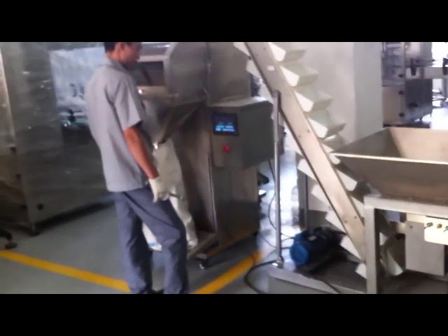 Polavtomatski stroj za pakiranje majhnih zrnc v vrečki
